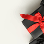 Present wrapped in black paper to represent Black Friday Advertising